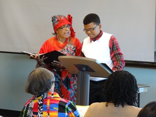 AARI woman and young man reading together