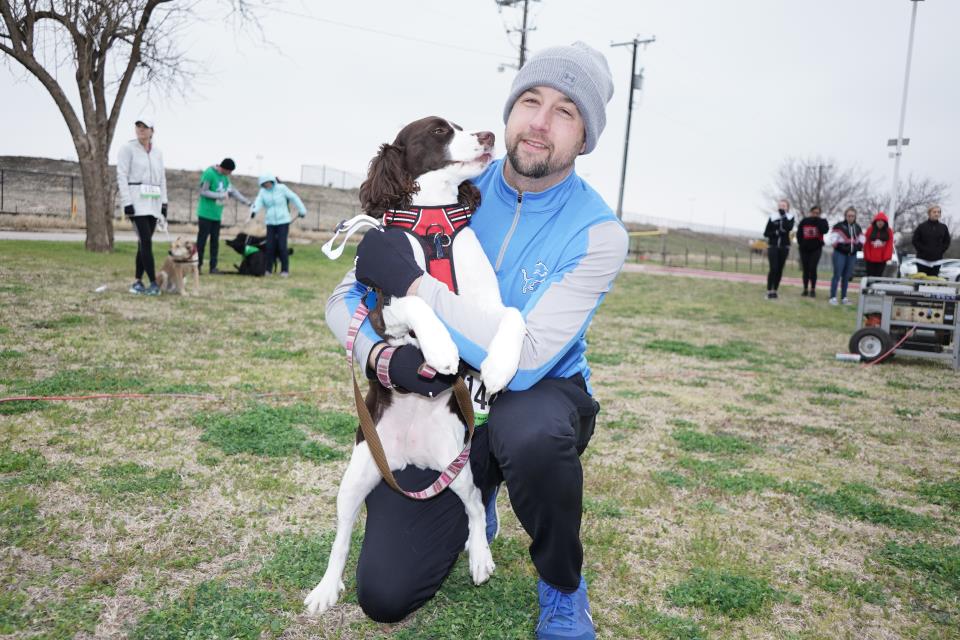 Run for Rover runner with his dog