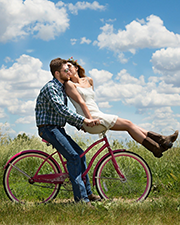 couple riding bike