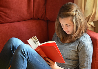 teen girl reading book