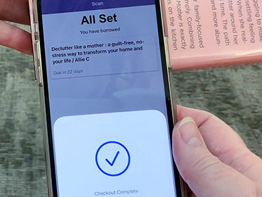 using phone to check out item at the Library in cloudLibrary app