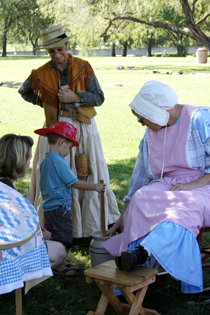 Texana Living History Association - Making butter