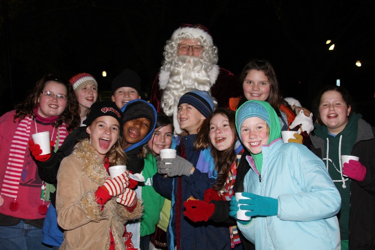 Girl scout troop with Santa.