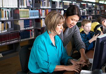 librarian helping customer