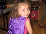 Photo of girl with gift bag